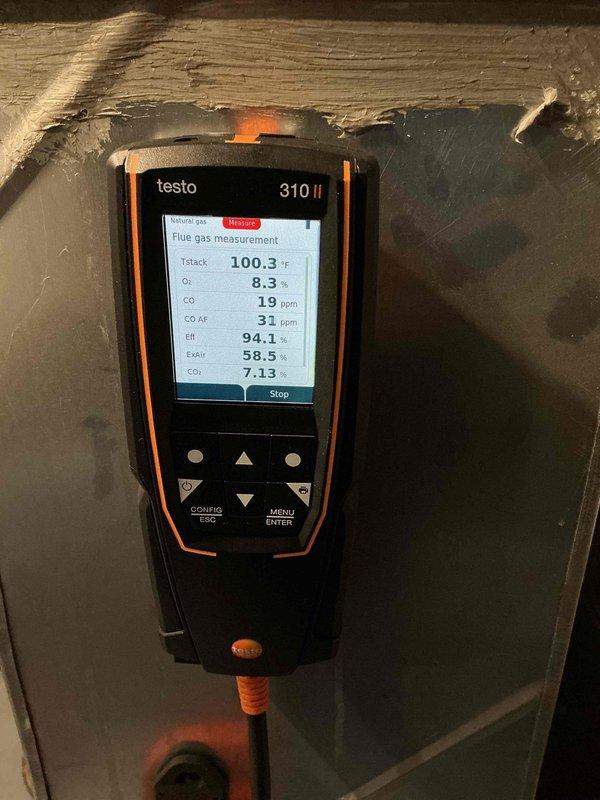 Performed routine maintenance on 3-year-old furnace. Conducted flue gas analysis with Testo 310 II showing normal combustion parameters (CO: 19ppm, efficiency: 94.1%). Inspected and verified proper operation of installed Aprilaire whole-house humidifier system connected to the ductwork.