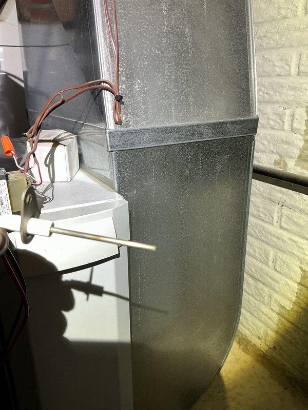 Performed scheduled furnace maintenance and conducted a thorough inspection of the heating system. Tested electrical components with multimeter showing 37.2 reading on the system's electrical circuits. Examined thermostat functionality as requested and verified proper operation of ductwork connections to ensure optimal airflow.