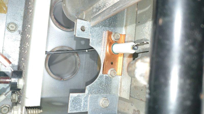 Responded to no heat call for natural gas furnace. Upon inspection, found moisture accumulation on internal components and identified a faulty ignition system. Replaced ignition assembly and restored proper heating function.