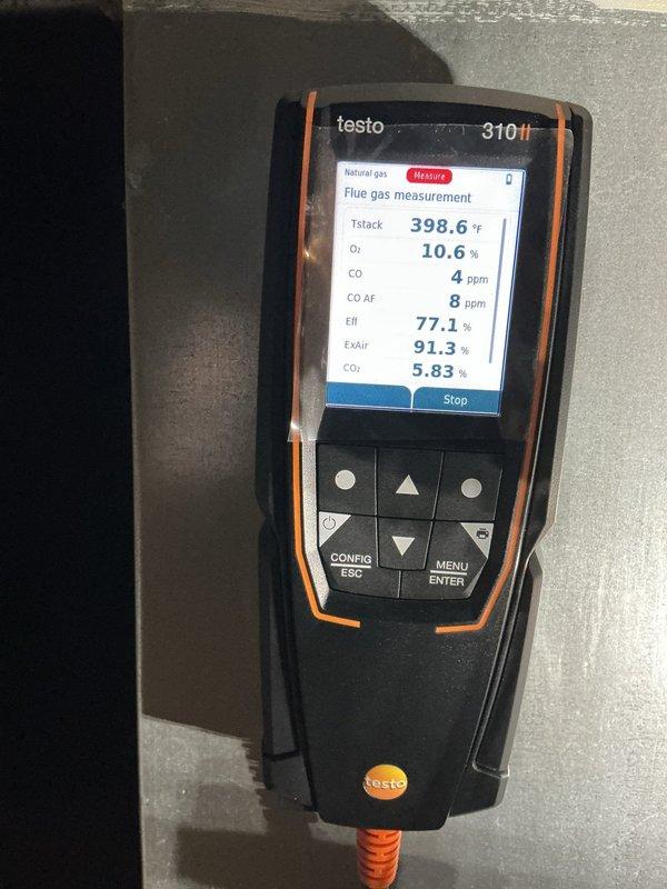 Replaced inducer motor, flame sensor, and pressure switch on furnace. Verified proper combustion with Testo analyzer showing good readings (CO: 4ppm, efficiency: 77.1%). System now operating with strong, even flame pattern across heat exchanger. Parts sourced from shop inventory.