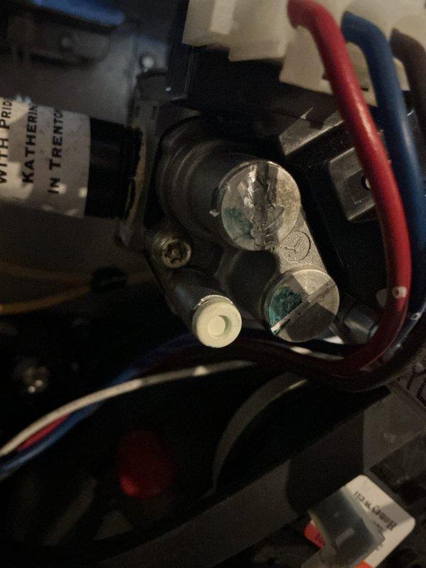 Performed routine maintenance tune-up on 10+ year old natural gas furnace, including inspection of gas valve connections and wiring. Accessed internal components by removing front panel to evaluate system condition, with particular attention to electrical connections and combustion controls. System was returned to service in proper working order with all panels secured.