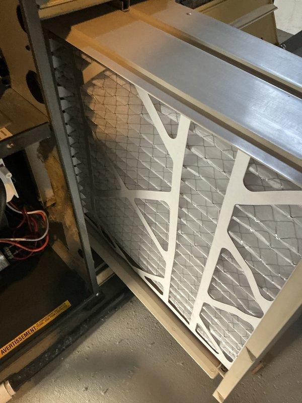 Performed routine maintenance on a natural gas furnace. Conducted electrical testing with multimeter to verify proper voltage and component functionality. Inspected and verified condition of air filter within the air handler unit.