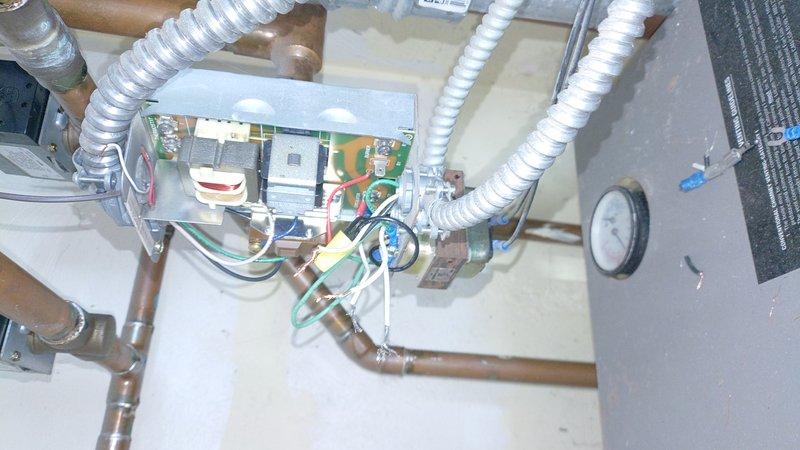Responded to callback regarding aquastat issue. Retrieved replacement part from shop, installed new aquastat on customer's heating system. Verified proper operation of control panel and inspected copper piping network, which showed normal oxidation. System now operating within parameters.