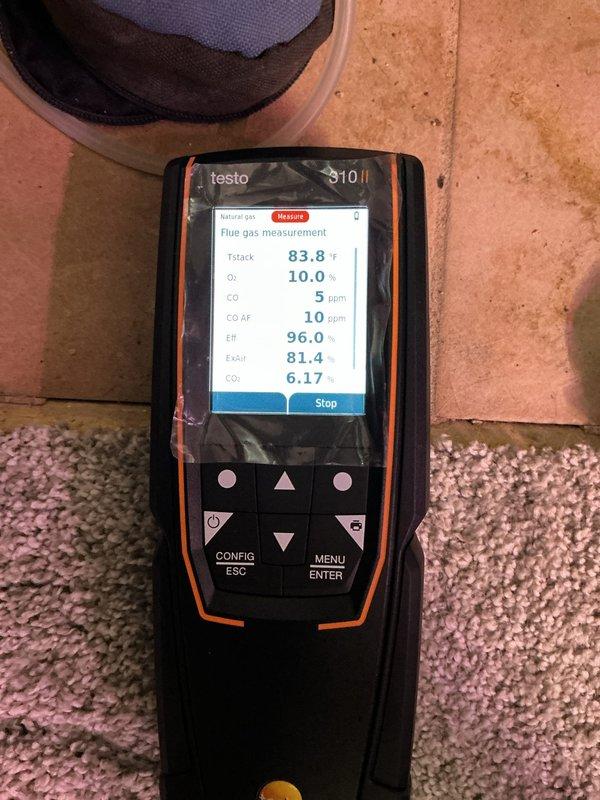 Performed comprehensive furnace maintenance service including combustion analysis with Testo 310 gas analyzer. System testing confirmed excellent efficiency rating of 96.0% with minimal CO emissions (5 ppm). All components inspected and verified proper operation of residential heating system.