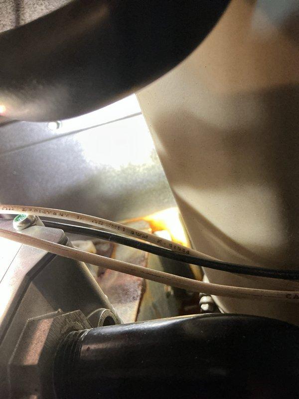 Performed routine maintenance on a 3-year-old furnace, inspecting electrical connections and interior components. Checked wiring integrity and verified proper mounting of metal chassis components. All systems functioning normally with no issues detected.
