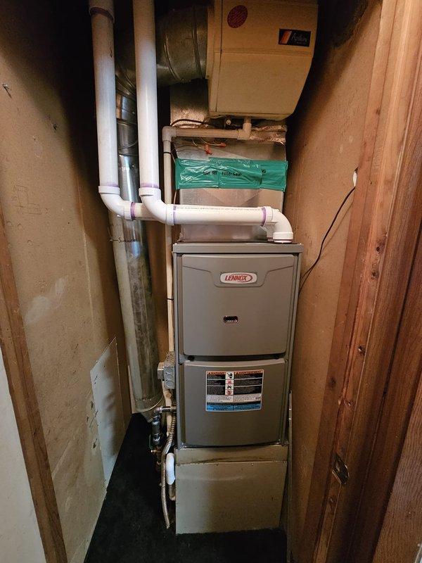 Successfully installed a 70kbtu 96% efficient Lennox downflow furnace, including fabrication of required metal spacer and replacement of approximately 10' of 2" venting. System was properly leveled during installation and connected to a new Honeywell T6 Pro thermostat for optimal temperature control.