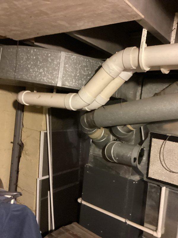 Completed routine furnace maintenance on natural gas system with MVP configuration. Inspected PVC ventilation/drainage infrastructure, confirming proper installation with no signs of leaks or deterioration. All components including ductwork and plumbing connections were verified to be in good working condition.