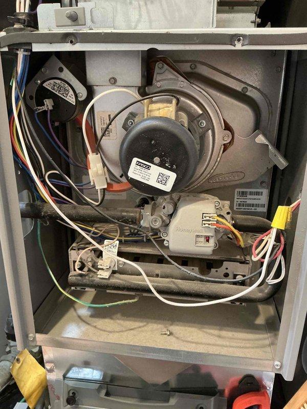 Responded to service call for 5-year-old natural gas furnace that would ignite but shut down prematurely. Inspected circuit board, electrical connections, and draft inducer motor assembly. Determined faulty pressure switch was causing improper flame sensing and system shutdown. Replaced pressure switch, verified proper ignition sequence, and confirmed continuous operation through multiple heating cycles.