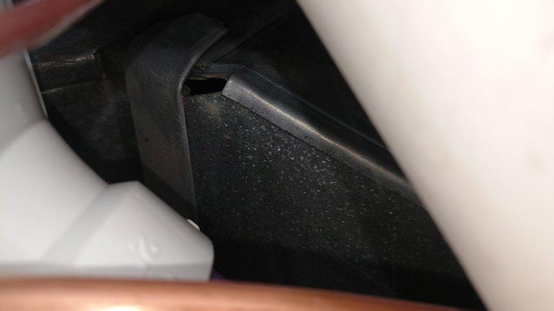 Responded to city inspection findings regarding furnace air leakage and heat pump deficiencies. Inspected internal furnace components and refrigerant lines, documenting issues with photos. Found improper fuse sizes and missing safety caps on heat pump unit that require correction to meet code requirements.