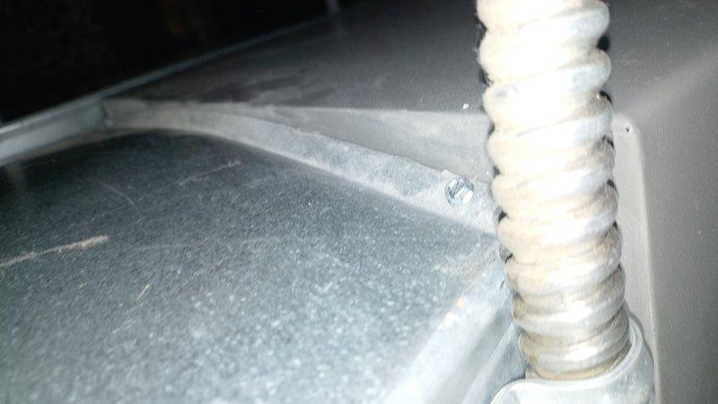 Responded to city inspection findings regarding furnace air leakage and heat pump deficiencies. Inspected internal furnace components and refrigerant lines, documenting issues with photos. Found improper fuse sizes and missing safety caps on heat pump unit that require correction to meet code requirements.