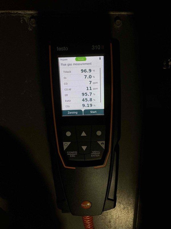 Performed comprehensive furnace maintenance including inspection of internal components, electrical connections, and gas control valve assembly. Removed accumulated dust and addressed minor corrosion. Conducted flue gas analysis using Testo 310 analyzer, which confirmed proper system operation with excellent efficiency (95.7%), appropriate oxygen levels (7.0%), and safe CO readings (7 ppm), indicating the system is operating within manufacturer specifications.