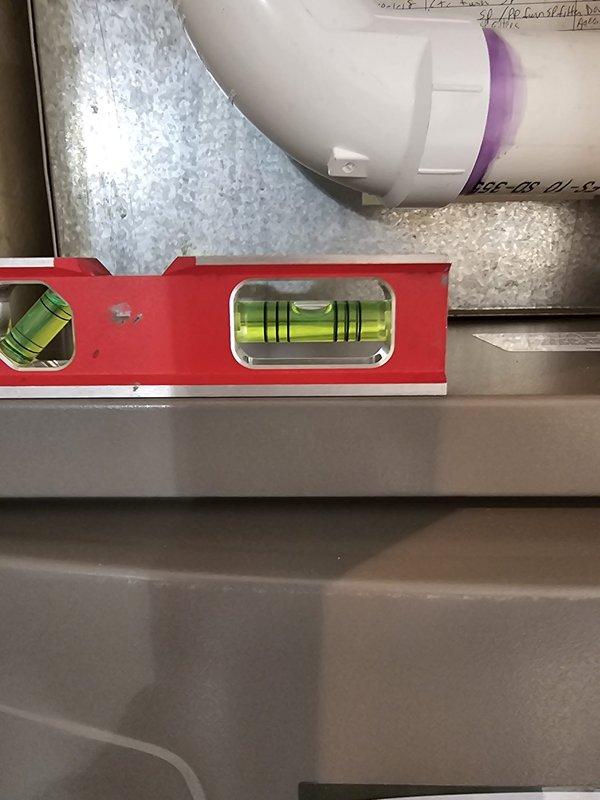 Completed installation of new 96% downflow furnace (70k BTU) with downflow evaporator coil in tight closet space. Installed new metal ductwork, lineset, equipment pad, 30-amp electrical disconnect, and L-40 thermostat. Ensured proper leveling of all components for optimal system performance.