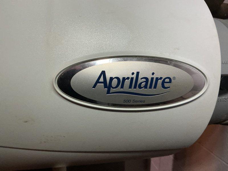 Performed scheduled heating maintenance service. Inspected Aprilaire 500 Series whole-home humidifier, verifying proper mounting to ductwork, water supply connection integrity, and overall operational condition. Unit appears functional with normal wear; documented installation with photos showing humidifier mounted to ductwork with connected water supply and drain lines.
