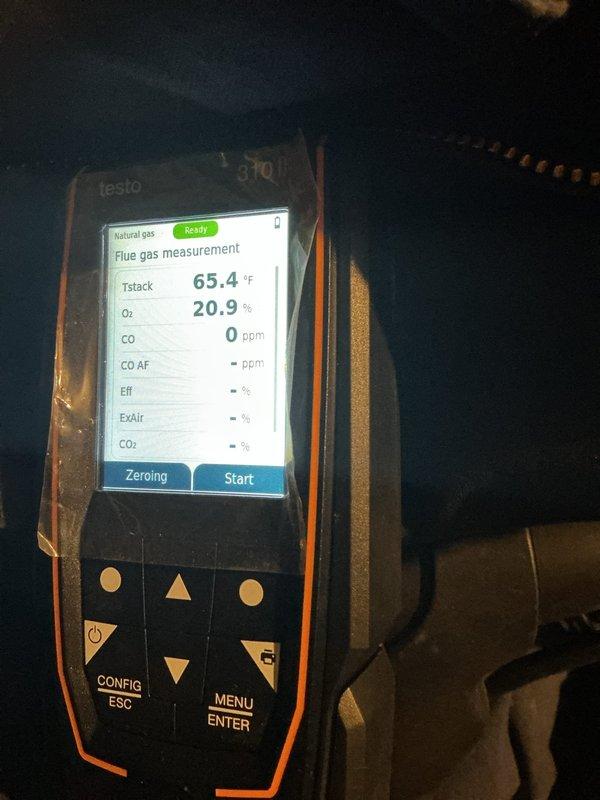 Performed routine furnace maintenance and conducted combustion analysis using Testo analyzer, which confirmed proper operation with no CO detected (0 ppm) and normal oxygen levels (20.9%). Inspected internal components with front panel removed, verified proper venting through PVC pipes, and checked drainage system functionality.