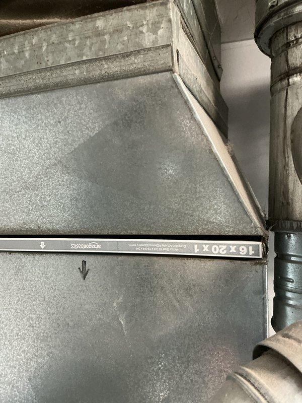 Performed routine furnace maintenance service. Conducted electrical testing with clamp meter on control components, confirming amperage reading of approximately 30. Inspected filter housing area (16x20x1) and ductwork connections for proper installation and condition.