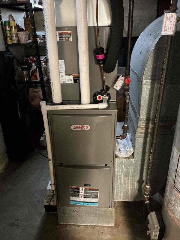 Performed standard heating maintenance on a Lennox furnace system. Conducted combustion analysis with Testo 310 II analyzer, confirming proper operation with 93.7% efficiency, CO levels at 9 ppm, and CO₂ at 7.97% for the natural gas system. All ventilation components and ductwork were inspected and found to be in satisfactory condition.