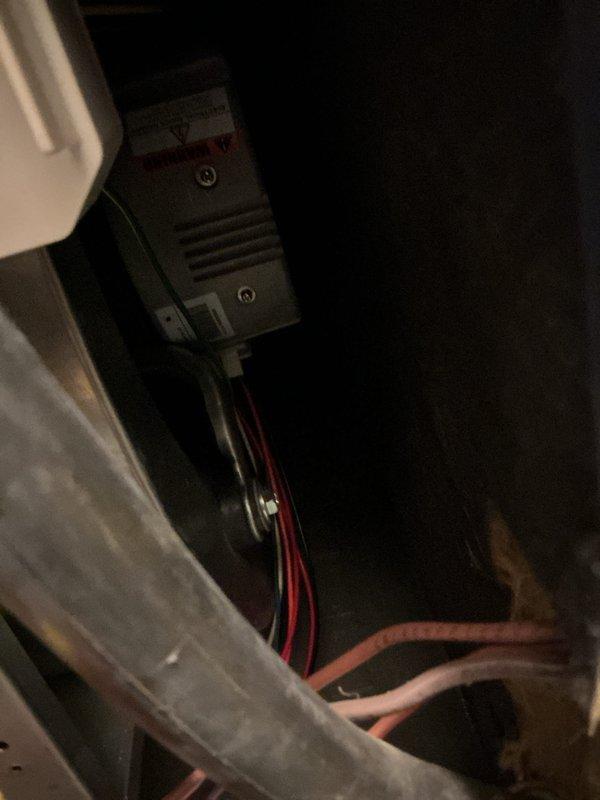 Performed routine furnace maintenance on 10-year-old heating system. Inspected electrical connections and gas valve assembly for proper operation, confirming all wiring (red, blue, green, purple, white) was securely connected to control board. Verified proper function of gas valve and documented condition with diagnostic photos.