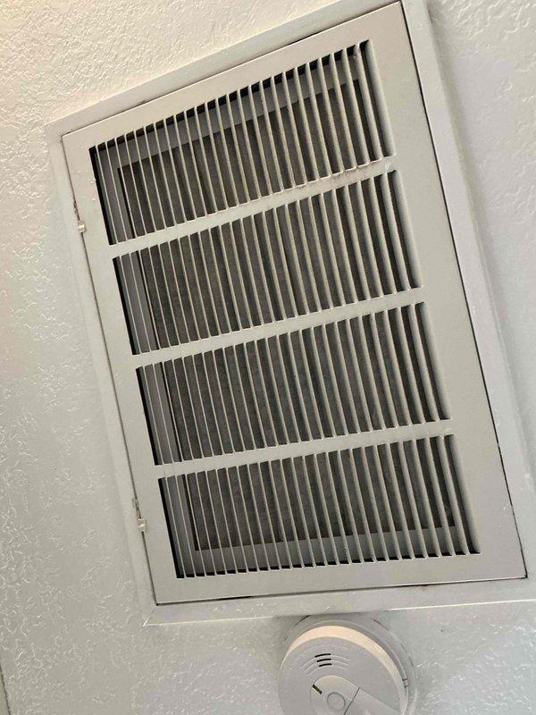 Responded to no-heat call at residential property. Inspected furnace system located in utility closet with associated ductwork and ventilation components. Diagnosed and restored heating functionality by clearing obstructed condensate drain line and resetting system safety switch. Verified proper operation of all heating components and confirmed adequate airflow through return vents before completing service.