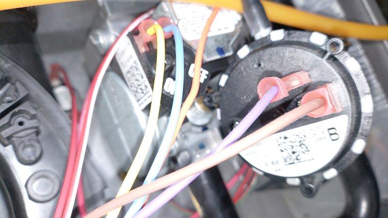 Performed diagnostic service on 5-year-old gas furnace that was short-cycling before reaching set temperature. Inspected blower motor assembly and pressure switch connections, finding dust accumulation on components. Cleaned system and verified proper operation, resolving the heating performance issue.