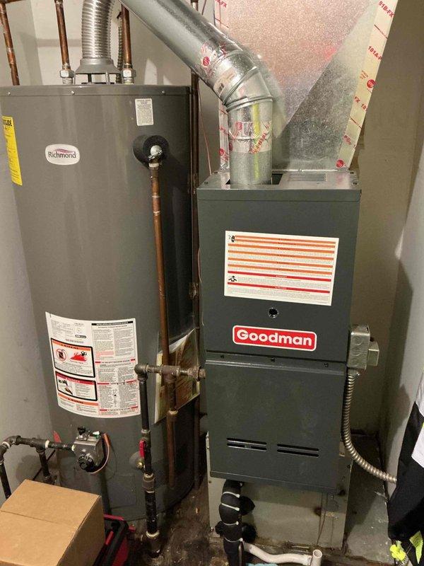 Replaced inducer motor on 10-year-old Goodman furnace that was causing rattling noise during startup. Completed installation using factory-supplied warranty parts (part #113310M0002SP). Performed comprehensive furnace cleaning and maintenance as part of system service agreement.
