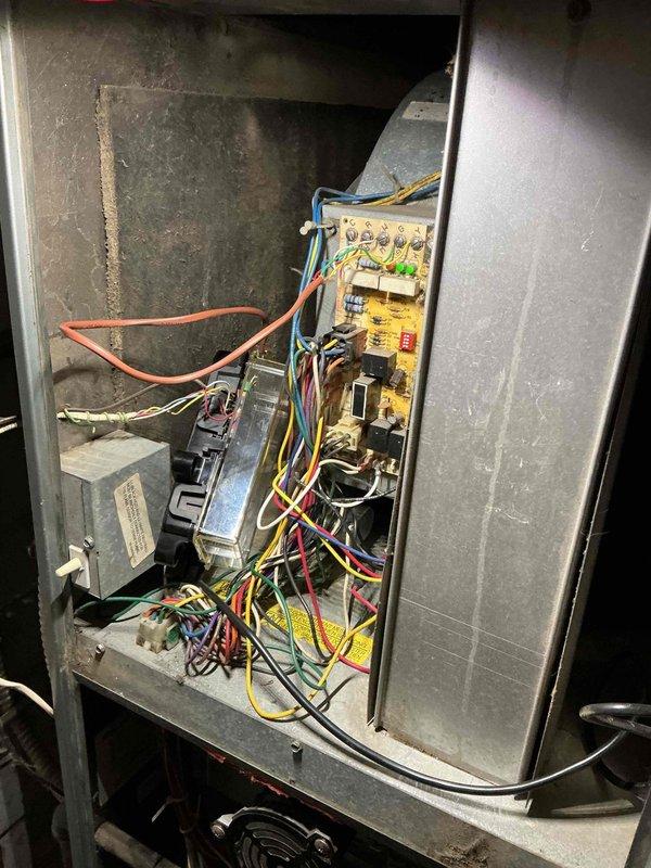 Responded to service call for a less than one-year-old gas furnace not producing heat in a crawlspace installation. Inspection revealed disconnected ductwork, likely caused by animal intrusion similar to previous raccoon damage. Reconnected and properly secured all ductwork connections, and verified proper system operation with normal heat output restored.