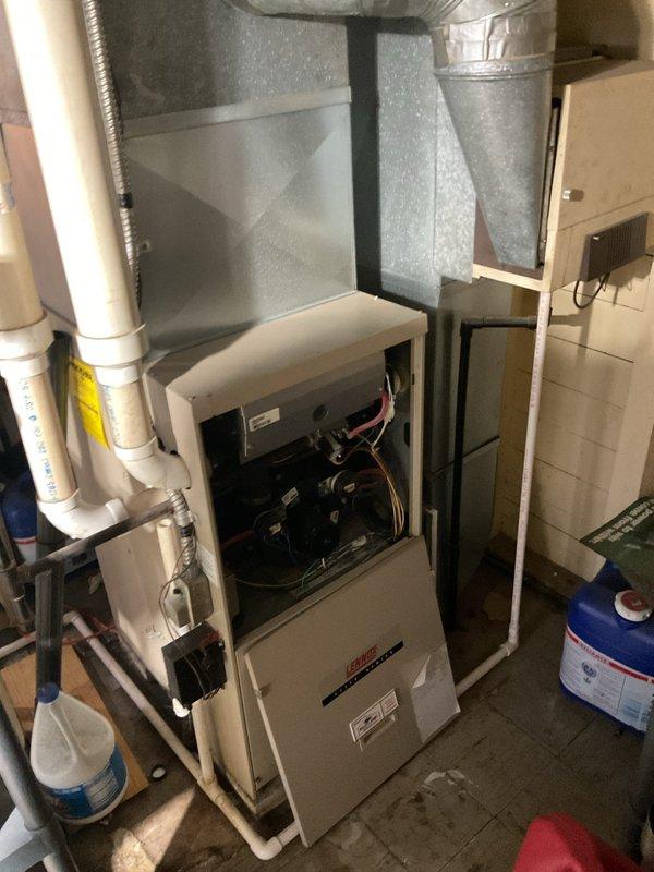 Conducted a comprehensive assessment of the existing HVAC system in the residential mechanical room, documenting the current furnace installation with exposed internal components and associated ductwork. Took detailed measurements and photographs of the complete setup, including the insulated duct piping, PVC ventilation lines, and connection points to facilitate accurate replacement planning. Finalized quote for system replacement and collected initial down payment from customer.