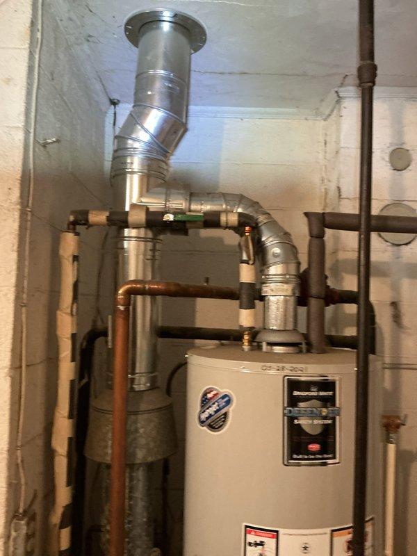 Responded to service call for 10+ year old gas/steam boiler system with reported water leakage and inoperable heating. Upon inspection, confirmed failure of boiler feed pump as previously diagnosed. Replaced defective pump, secured all pipe connections, and performed system pressure test to verify proper operation. System is now functioning correctly with no leaks observed.