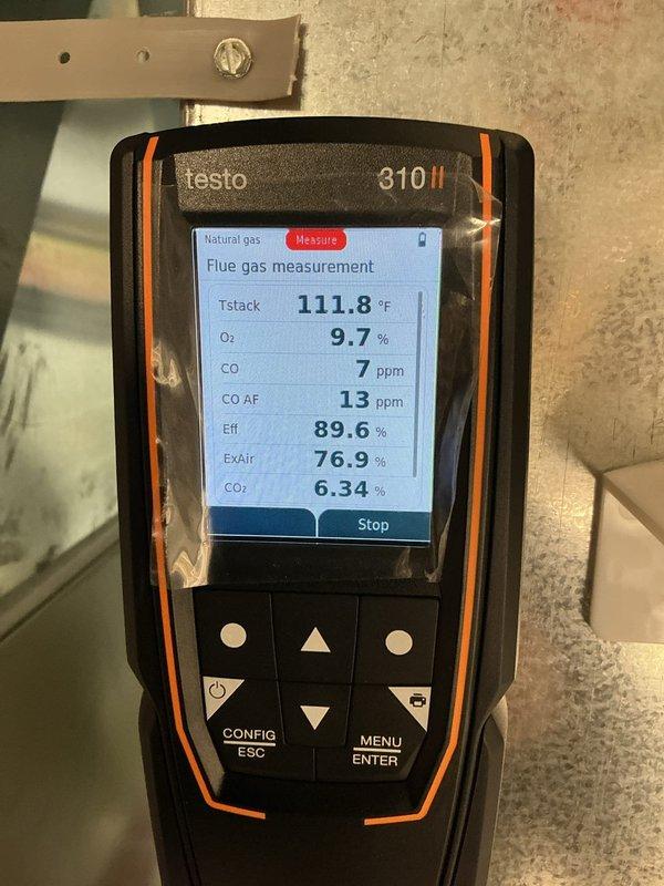 Performed routine heating maintenance on a 10+ year old furnace. Conducted combustion analysis with Testo 310 II gas analyzer showing 89.6% efficiency with acceptable CO levels (7 ppm). Inspected electrical connections and wiring at the control board, noting some corrosion on the unit base where it contacts the concrete floor.