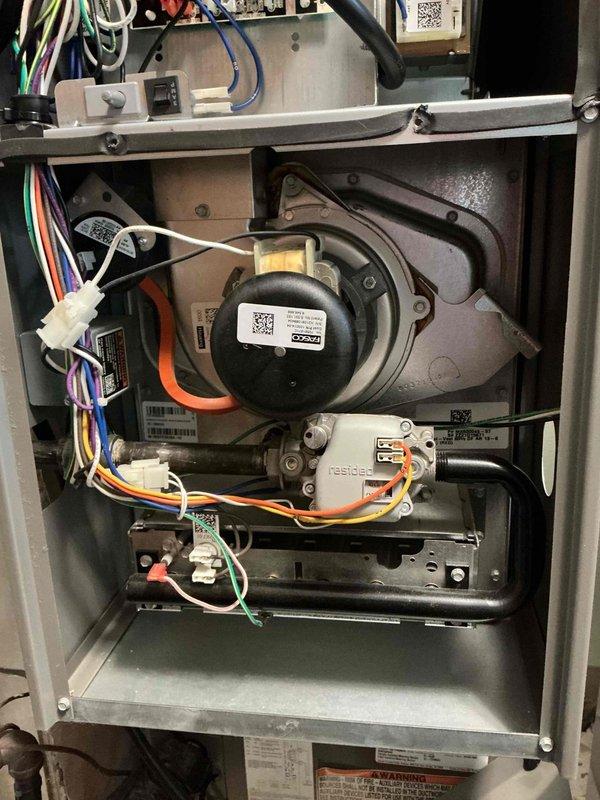 Performed scheduled furnace maintenance service on a Carrier unit. Inspected internal components including blower motor, control board, and wiring connections - all found in good working condition with no visible damage. Offered customer a maintenance plan to cover future heating visits.
