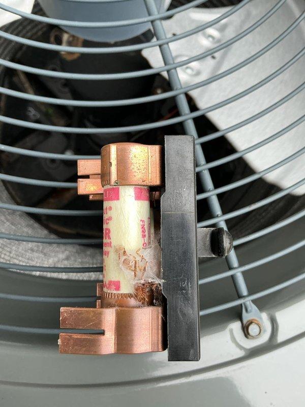 Performed routine A/C maintenance inspection on system. Examined dual element time delay fuses (45A 250V Gould Shawmut Tri-onic TR 45R) and observed some oxidation on copper components. System operating normally after service.
