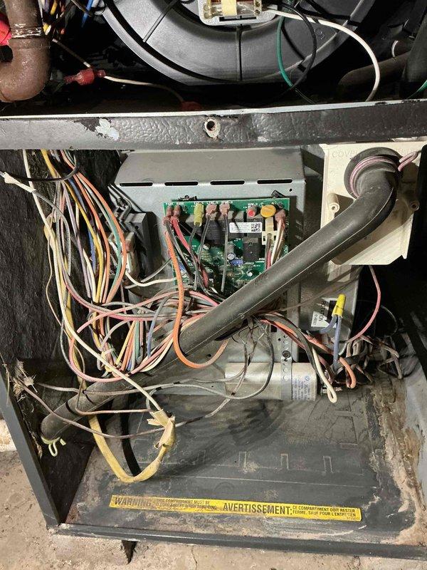 Performed routine maintenance service on 5-year-old furnace system. Inspected and tested control board functionality, verified proper electrical connections, and examined blower motor assembly for optimal operation. Checked condensate drainage system and confirmed proper ventilation through PVC intake/exhaust piping. All components functioning within manufacturer specifications; no issues requiring repair were identified.