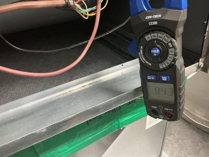 Performed dual furnace maintenance service with comprehensive electrical testing. Conducted voltage measurements on system components with readings of 9.43V and 47.5V observed on digital multimeters. Customer expressed interest in maintenance membership program for future service.