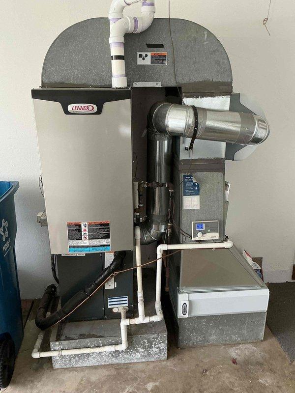 Performed routine maintenance on 2-year-old Lennox furnace system. Inspected PVC ventilation piping and connections, confirming proper sealing at all joints. Verified system operation and airflow through existing ductwork; all components functioning within normal parameters.