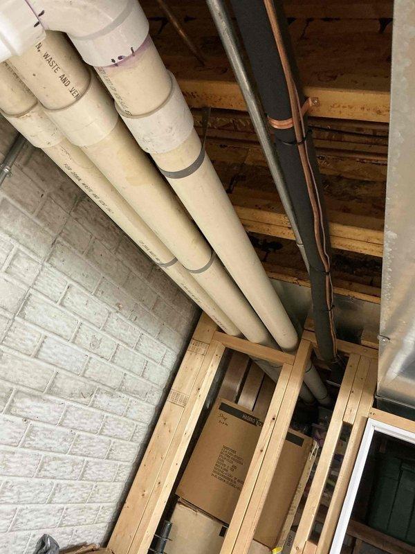 Performed annual furnace maintenance service on Lennox heating system located in basement. Inspected air handler, heat exchanger, and PVC exhaust/intake components, all in working order. Identified noisy fan issue with water heater; diagnostic assessment completed and repair quote provided to customer.