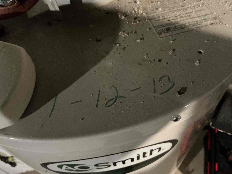 Performed routine furnace maintenance service and inspected customer's water heater which showed significant mineral deposits and corrosion on copper pipes and fittings. Documented buildup around pipe connections and pressure release valve, noting the aged condition of plumbing components. Customer was provided with recommendations for addressing the deteriorating vent in bedroom as requested.