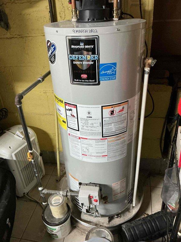 Performed annual heating tune-up on natural gas furnace. Combustion analysis revealed system operating at 80.2% efficiency with safe CO levels (11 ppm). Noted Bradford White water heater (installed March 2022) in good condition with proper connections and safety systems intact.