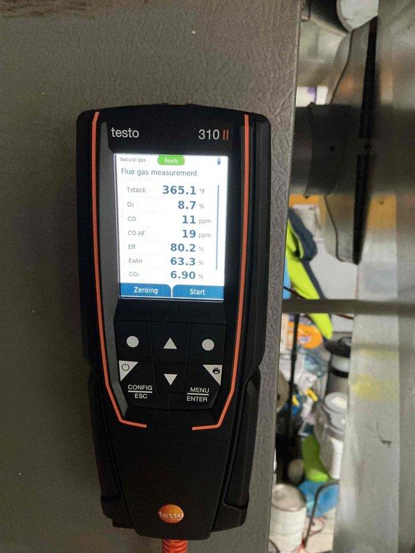 Performed annual heating tune-up on natural gas furnace. Combustion analysis revealed system operating at 80.2% efficiency with safe CO levels (11 ppm). Noted Bradford White water heater (installed March 2022) in good condition with proper connections and safety systems intact.