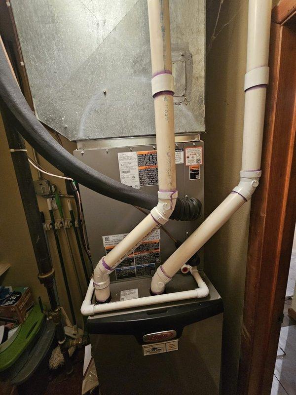 Successfully installed a 3-ton 2-stage AC package with upflow cased coil, including new metal fabrication, lineset routing through attic, and condenser relocation 3' from electrical panel. Completed installation with new equipment pad, disconnect and whip, while reprogramming existing Honeywell T6 thermostat for 2-stage cooling operation.