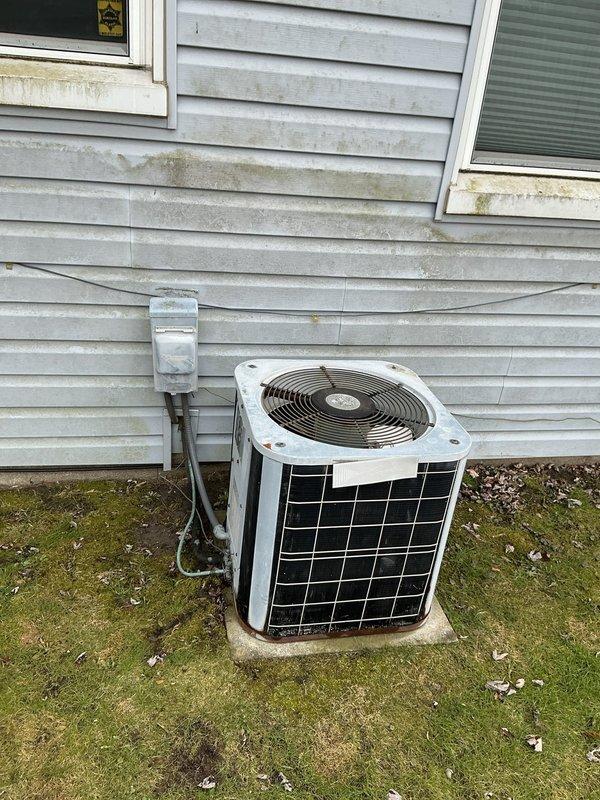 Replaced dirty air filter in furnace which was causing system non-operation due to filter restriction safety. Inspected outdoor condensing unit which showed normal weathering but no immediate service needs. System now operating normally.