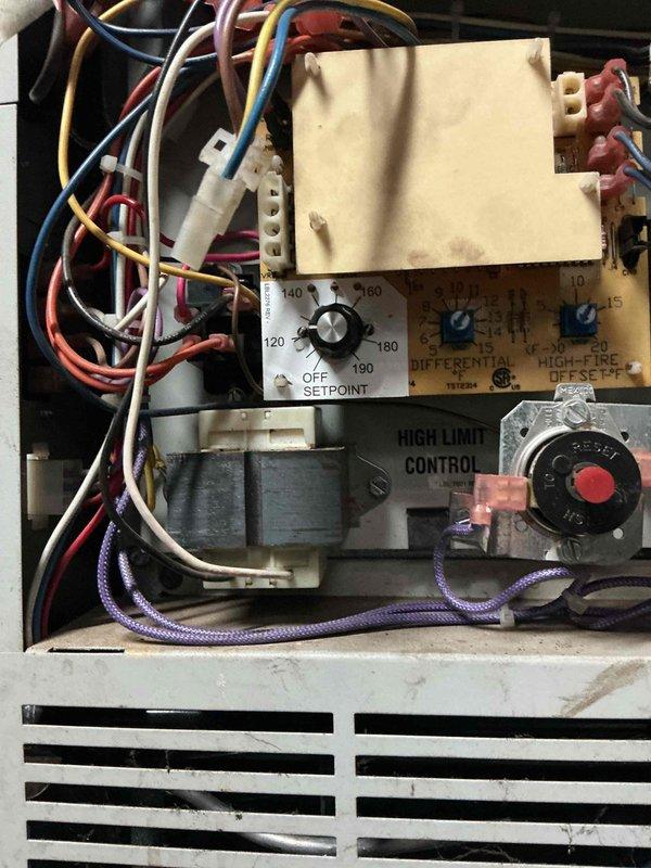 Performed scheduled maintenance on hot water tank boiler system. Inspected control board, high limit control, and temperature setpoint (currently at 140°-150°). Cleaned components and connections to ensure optimal functionality of heating system.