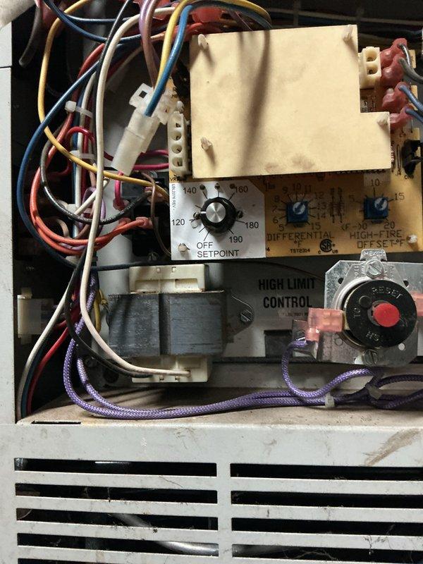 Performed scheduled maintenance on hot water tank boiler system. Inspected control board, high limit control, and temperature setpoint (currently at 140°-150°). Cleaned components and connections to ensure optimal functionality of heating system.