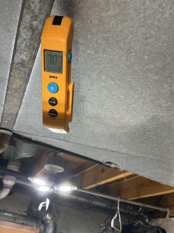 Performed scheduled maintenance on 6-year-old HVAC system. Conducted temperature differential testing with digital SPK2 meter showing appropriate readings of approximately 70°. Inspected and cleaned air filter components using appropriate tools.
