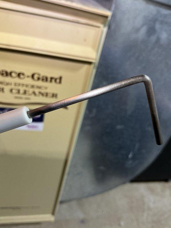 Performed scheduled maintenance on 6-year-old HVAC system. Conducted temperature differential testing with digital SPK2 meter showing appropriate readings of approximately 70°. Inspected and cleaned air filter components using appropriate tools.