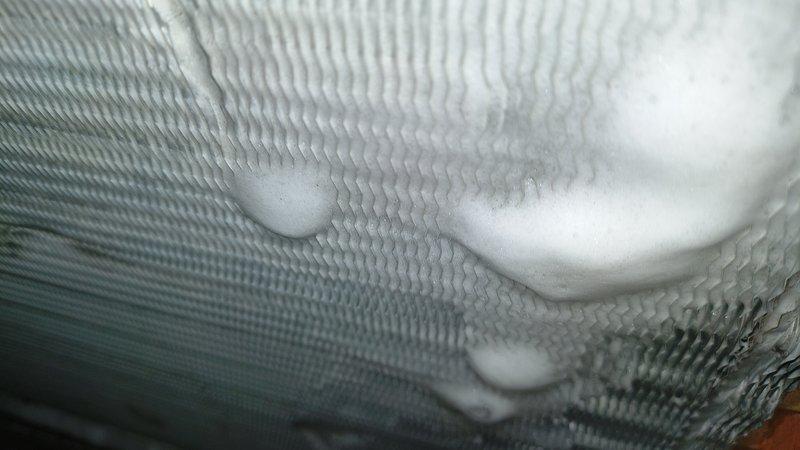 Performed evaporator coil cleaning service on HVAC system that exhibited significant frost buildup on cooling surfaces. Thoroughly cleaned the evaporator coil assembly, inspected connected ductwork and refrigerant lines, and restored proper system operation. Unit now functioning correctly with improved airflow and thermal efficiency.