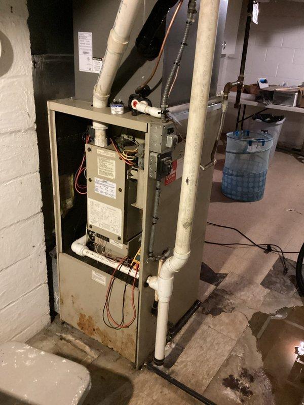 Responded to no-heat call for furnace of undetermined age. Inspected electrical panel and found tripped circuit breaker; reset breaker to restore power. Performed diagnostic check of furnace control board and internal components, confirming proper operation after power restoration.