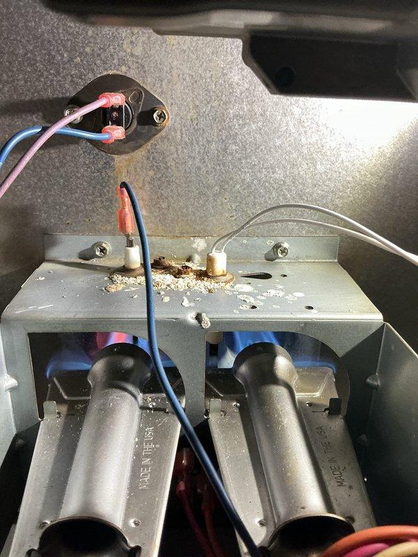 Performed routine maintenance on 12-year-old gas furnace. Inspected burners for proper ignition and flame pattern; observed normal blue flames with no concerning color variations. Checked and replaced standard 16x20x1 air filter, noting some corrosion on connection points but all electrical components functioning properly.