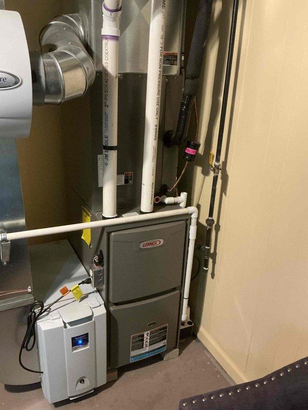 Performed comprehensive heating maintenance service on a Lennox furnace system. Inspected all components including PVC intake/exhaust venting, ductwork connections, and auxiliary equipment. System is functioning properly with no issues identified at this time.