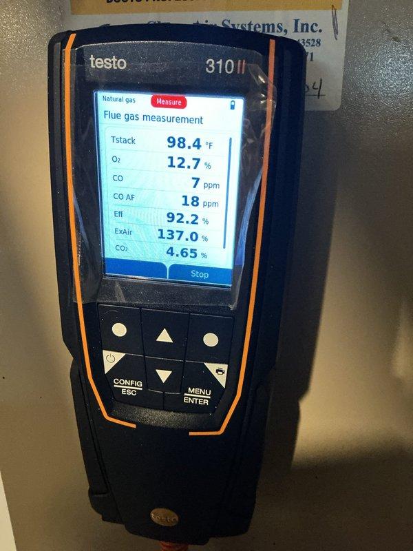 Performed scheduled heating maintenance service. Conducted comprehensive combustion analysis on natural gas system using Testo 310 II analyzer, confirming proper operation with excellent efficiency readings (92.2-93.2%). Documented optimal CO levels (7-12 ppm) and verified system is operating safely with good combustion parameters.