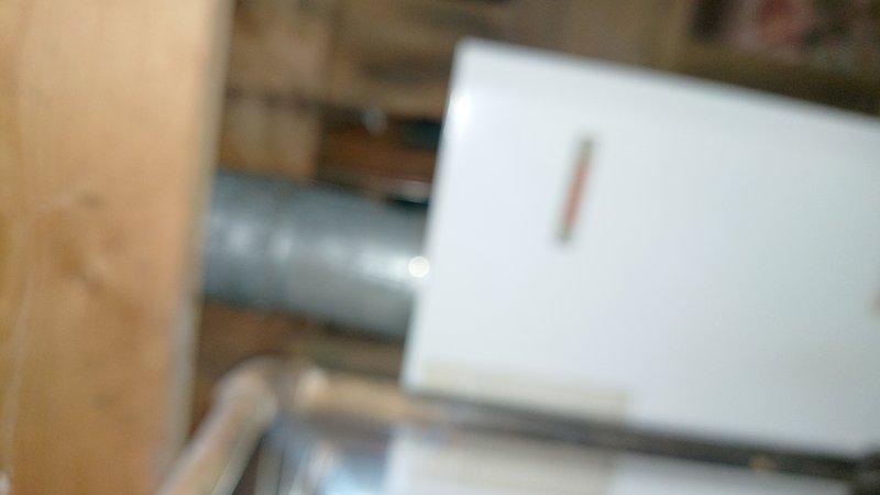 Responded to service call for tankless water heater producing only lukewarm water. Accessed unit in 4-foot crawl space to diagnose issue. Inspected copper piping connections and heating elements, performed necessary maintenance to restore proper hot water temperature functionality.