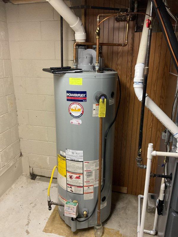 Completed estimate for replacement of existing water heater with a new 50-gallon PowerFlex power vent unit. Assessed current installation configuration in basement utility area, noting copper supply lines, PVC venting, and gas connection requirements. Documented existing setup with photos to ensure proper sizing and compatibility for the proposed replacement.